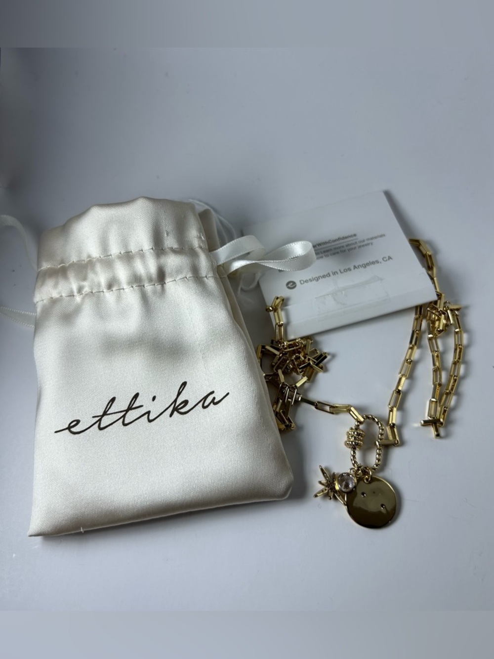 ettika Gold Starburst Crystal & Disc Charm Pendant Necklace - Picture 8 of 9